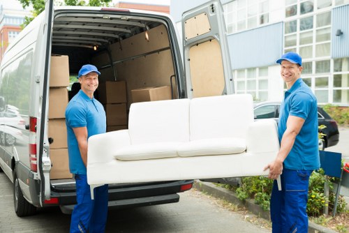 Furniture removal team loading household items in Hounslow