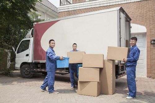 Furniture pick-up team removing bulky items from a Hounslow home
