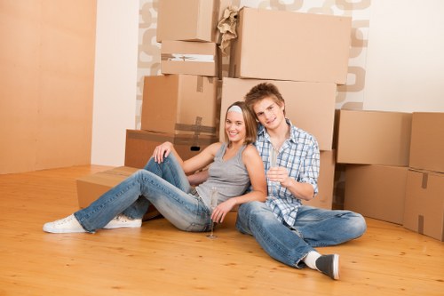 Careful moving of bulky furniture in a local Hounslow street