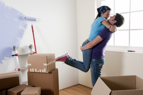 Man and van team preparing items safely before loading