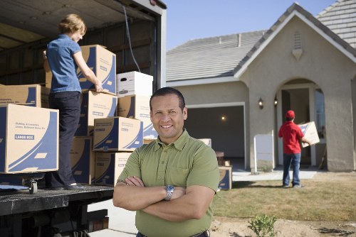 Boxes and furniture prepared for a removal van service