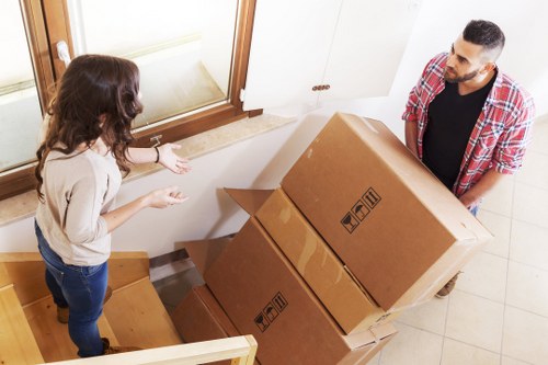 Packed boxes and furniture ready for an apartment relocation