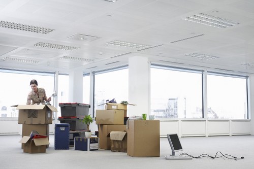 Unpacking boxes into a new property with room-by-room organisation