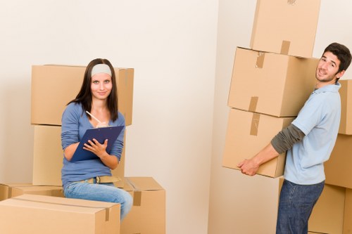 Packed moving boxes and furniture for a home relocation